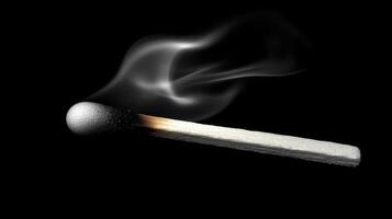 A matchstick with smoke coming out of it photo