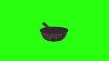 Realistic 3D rendering of a vintage frying pan on green background video