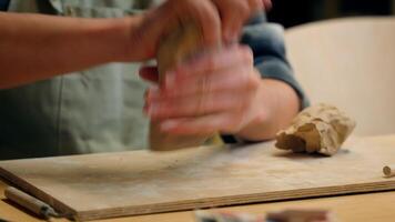 Male hands mash clay modeling process sculpt Caucasian man artist potter sculptor in pottery workshop artisan craftsman handmade hobby craft creating working stoneware material handcraft in art studio video