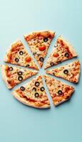 Pizza slices flat bread with cheese, olive, and sausage in soft blue background photo