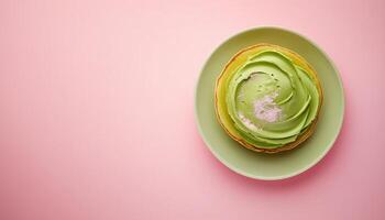 Sweet pancake with matcha cream topping on plate for simple breakfast photo