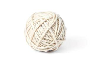 Isolated white wool yarn ball on a white background, perfect for crafting, knitting, and crocheting projects, symbolizing creativity and handmade warmth. photo