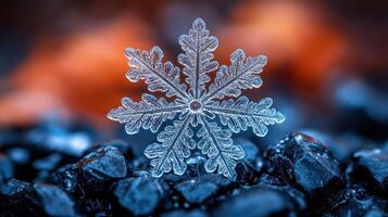 Intricate snowflake on dark stones, fiery background, winter nature macro shot, holiday card photo