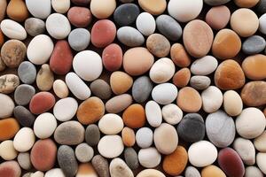 A large pile of pebbles with different colors photo