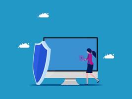a woman is standing next to a computer screen with a shield vector