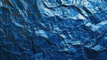 Crumpled blue paper texture background photo