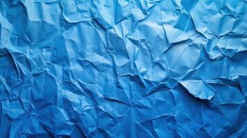 Crumpled blue paper background photo