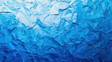 Crumpled blue paper texture background photo