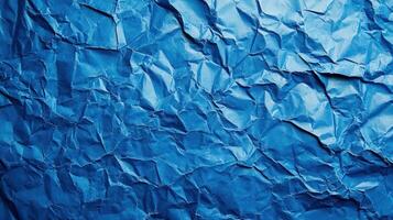 Crumpled blue paper background photo