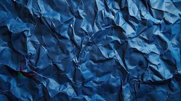 Crumpled blue paper background photo