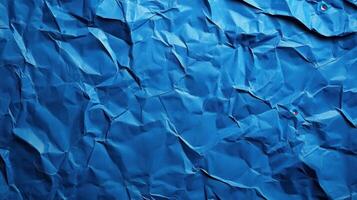 Crumpled blue paper background photo