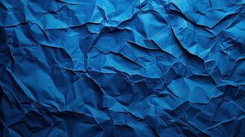 Crumpled blue paper background photo
