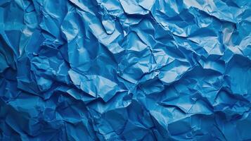 Crumpled blue paper background photo
