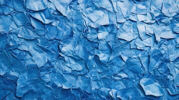 Blue crumpled paper texture background photo