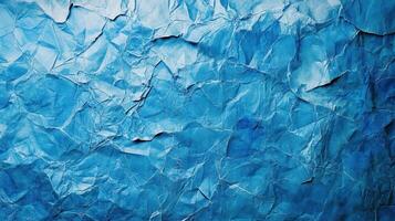 Crumpled blue paper texture background photo