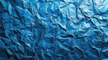 Crumpled blue paper background photo