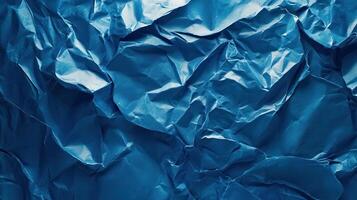 Crumpled blue paper background photo