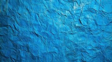 Blue crumpled paper texture background photo