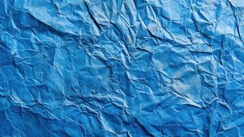 Crumpled blue paper texture background photo
