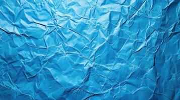 Crumpled blue paper background photo