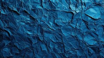 Crumpled blue paper texture background photo