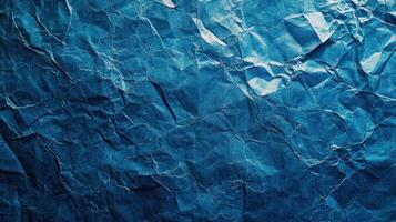 Crumpled blue paper texture background photo