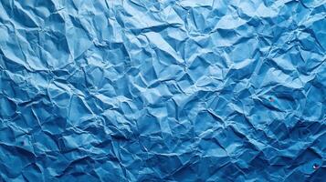 Crumpled blue paper background photo