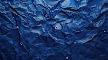 Crumpled blue paper background photo