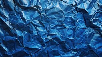 Crumpled blue paper background photo