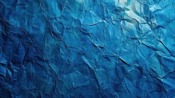Blue crumpled paper texture background photo