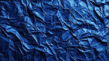 Crumpled blue paper texture background photo