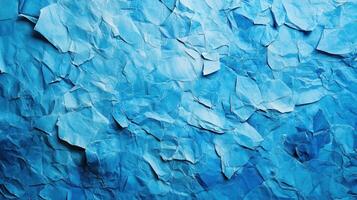 Crumpled blue paper texture background photo