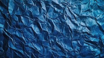 Crumpled blue paper texture background photo