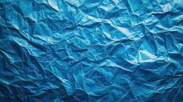 Crumpled blue paper background photo