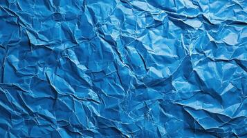 Crumpled blue paper background photo