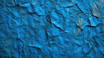 Blue crumpled paper texture background photo