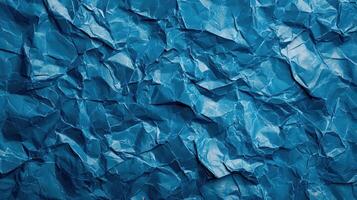 Crumpled blue paper background photo