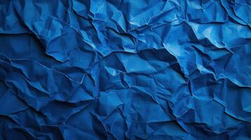 Crumpled blue paper background photo