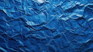 Crumpled blue paper background photo