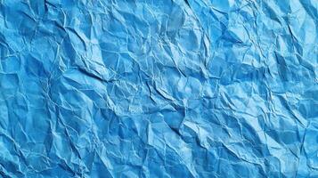 Crumpled blue paper texture background photo