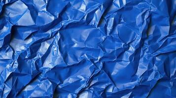 Crumpled blue paper background photo