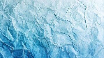 Crumpled paper background with blue and white colors photo