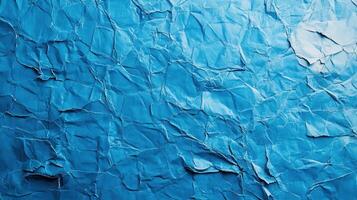 Crumpled blue paper texture background photo