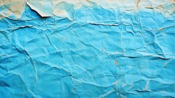 Crumpled blue paper texture background photo