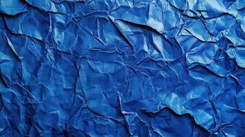 Crumpled blue paper texture background photo