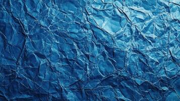 Crumpled blue paper background photo