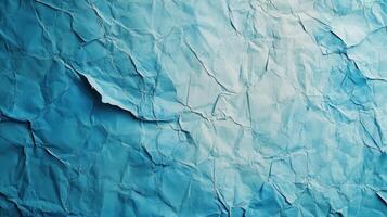 Crumpled paper background with blue color photo