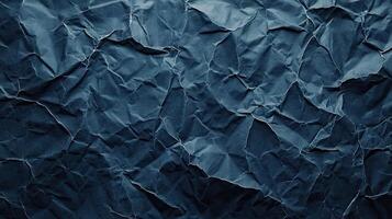 Crumpled paper background with blue color photo