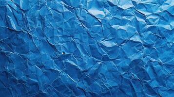 Crumpled blue paper texture background photo