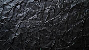 fondo de textura de papel arrugado negro foto